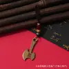 Llavero de aleación imitación cobre colgante pequeño puesto callejero display cobre viejo de Yunnan calle de pequeños productos de Yiwu modo puesto callejero fuente
