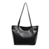 Bolsa Grande com Textura Feminina 2026 Outono Novo Estilo Moda Comute Bolsa de Ombro Cor Sólida Elegante Bolsa de Mão Tote