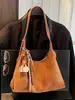 Bolsa Feminina de Axila Alto Padrão Luxo Leve Nicho Versátil para o Dia a Dia Outono/Inverno Estilo Retro Melanístico Bolsa Tote de Ombro Único