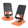 Soporte de teléfono naranja totalmente metálico, soporte de escritorio giratorio y plegable para tableta, adecuado para transmisiones en vivo y maratones de series