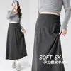 Saia de maternidade para outono, saia midi de tecido macio para grávidas, outono e inverno, sem suporte para a barriga, comprimento médio, moda gestante petite