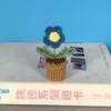 Planta de margarida afegã em vaso feita à mão em crochê, fofa decoração de mesa para casa, planta em vaso de flor artificial trançada