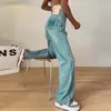 Jeans retrô azul de perna larga para mulheres, cintura alta, modelador, caimento solto, estilo perna reta estreita, com bolsos traseiros desgastados, cobrindo o quadril e design até o chão.
