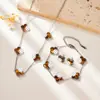 Conjunto Popular de Trébol de Cuatro Hojas Transfronterizo Pulsera y Collar de Acero Inoxidable Joyería de Lujo de Nicho Estilo Europeo y Americano