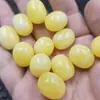 Sal flotante fluorescente agua salada cera de abeja cuentas grandes de arroz cuentas sueltas flor blanca artificial cera de abeja Ovalada pulsera de pase de camino accesorios de joyería