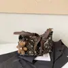 Estilo perezoso bolso pequeño plisado estampado de leopardo para mujer 2026 nuevo bolso de mano retro otoño e invierno sensación de alta gama bolso cruzado con correa ancha