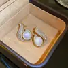 Pendientes de cobre chapados en oro vietnamitas con circonita de gota de agua de diamante completo y perla, pendientes de moda de alta gama exquisitos al por mayor