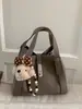 Bolso de Mano Casual de Gama Alta Tipo Cubo para Mujer 2025 Invierno Nuevo de Moda Versátil Elegante Bolso de Hombro Cruzado