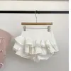 Nueva falda pastel de estilo coreano dulce inspirada en el ballet con volantes de cintura alta, adelgazante y anti-exposición, minifalda ajustada para mujer