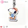 Llavero Colgante Transparente de Doble Capa de Acrílico de Snoopy Juego de Frijol Rojo Pequeño Merchandising Regalo para Mochila de Acrílico