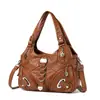 Bolso de hombro transfronterizo de gran capacidad para mujer, con múltiples bolsillos, un diseño retro y un look elegante inspirado en motocicletas, perfecto como bolso cruzado de moda