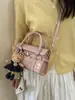 Bolsa de Mão Quadrada Pequena Casual Simples para Mulheres 2026 Nova Moda Primavera Versátil Bolsa de Ombro Transversal de Alta Qualidade