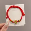 Pulsera de Hilo Rojo de Bebé de Dibujos Animados 2026 Nuevo Estilo Bendición Pequeño Zongzi Pulsera Estilo Chino Festival del Bote del Dragón Hilo de Cinco Colores Ajustable Venta al por Mayor