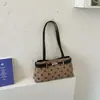 Bolsa de mão elegante de alta costura Shuai Mi Jia, bolsa simples de grande capacidade para mulheres, nova bolsa de ombro para o outono de 2026 para o dia a dia.