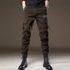 Pantalones de trabajo multi-bolsillo texturizados de algodón de fibra larga de alta densidad para hombre, corte holgado retro, color café, pantalones casuales funcionales tácticos de alta calle