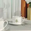 Xícara e Pires de Porcelana Europeia, Lembrança de Casamento e Aniversário, Xícara de Café de Aparência Sofisticada, Xícara e Pires de Lírio-do-Vale da Sorte, Atacado Transfronteiriço