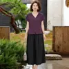 Elegante camiseta de cuello en V para madres, nuevo estilo de verano, conjunto de dos piezas de pantalones anchos holgados y falda para mujeres de mediana edad y mayores