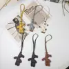 Colgante de Bolso de Oso Perezoso Lindo de Frijol de Dibujos Animados Llavero de Cuero de Diseño Creativo de Nicho Adorno de Regalo