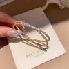 Pulsera Ovalada de Zirconia Chapada en Oro Real de 18k Moda Simple Versátil Anillo de Mano Lujo Ligero Nicho Sensación de Alta Gama Joyería de Mano