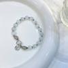 Pulsera colgante Fu estilo chino de ojo de gato piedra lunar lima para mujer diseño de nicho nuevo sensación de alta gama joyería elegante para la mano