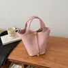 Bolso Pequeño Exquisito Transfronterizo para Mujer 2026 Nuevo Súper Popular Bolso Cubo Simple para el Trabajo Estilo Coreano Casual Bolso Cruzado