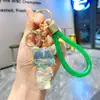 Llavero de Oso de Resina Transparente Blanco con Hojuelas Doradas Dibujo Animado Muñeca de Resina con Polvo Dorado Colgante Lindo para Bolso Pequeño Regalo