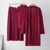 Conjunto casual de punto transfronterizo para mujer, nuevo estilo otoño e invierno, chaqueta de corte holgado, chaleco y falda conjunto de tres piezas