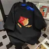 Marca Moderna Estadounidense Diseño de Papas Fritas Camiseta de Manga Corta para Mujer Verano 2026 Nuevo Versátil ins Algodón Puro Top para Pareja Hombre