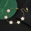 Traje de flor de cinco pétalos de acero inoxidable titanio acero pendientes de cinco pétalos pulsera collar al por mayor trébol de cinco hojas collar de flor de ciruelo juego de tres piezas
