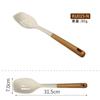 Nuevo juego de utensilios de cocina de silicona con mango de madera transfronterizo dedicado de 12 piezas, sartén antiadherente resistente a altas temperaturas, cuchara para sopa, colador y pala.