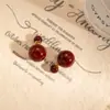 Pendientes de Perla Doble Cara Rojo Ankora Aguja Plateada Estilo Hong Kong Otoño/Invierno Pendientes de Lujo Retro Portables para Mujer