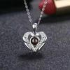 Joyas populares de comercio exterior transfronterizo collar 100 idiomas Te amo foto personalizada texto alas de amor colgante