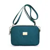 Bolsa de Ombro Cor Sólida em Tecido de Nylon Estilo Japonês e Coreano Versátil para o Dia a Dia da Mulher Bolsa Transversal de Grande Capacidade Bolsa para Compras da Mamãe Bolsa para Celular