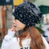 Gorro de pelo fino bufanda de doble uso gorro jersey estilo étnico estilo europeo y americano transfronterizo flor de anacardo gorra de punta gorro de maternidad
