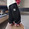 Pantalones tipo jogger holgados para niños, pantalones deportivos casuales grises para niños, pantalones de chándal versátiles con cintura elástica para niños pequeños y niños pequeños, pantalones de moda