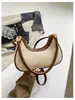 Bolsa feminina mais vendida no exterior 2026 nova moda versátil bolsa transversal de bolinho simples bolsa de ombro tecida para usar sob o braço para mulheres