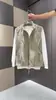 Chaleco chaqueta de trabajo de alta gama retro americano para primavera y otoño con bolsillo y cuello mao, chaleco casual holgado sin mangas versátil