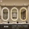 Espejo de baño de alta gama, espejo de baño LED inteligente ovalado sin marco, espejo de tocador montado en la pared, espejo inteligente