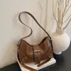 Bolso de Axila de Nicho de Moda Estilo Francés para Mujer Verano 2026 Textura Simple Versátil para Viajes Diarios Bolso de Hombro Cruzado