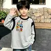 Camiseta de manga larga de algodón puro para niños, moda de primavera y otoño, capa base para niños, cuello redondo de dibujos animados, top holgado estampado versátil, camiseta moderna