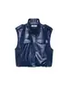 Conjunto de Chaleco con Correa de Efecto Piel Estilo Europeo y Americano Nuevo Verano 2026 + Minifalda de Efecto Piel con Remaches