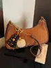Bolso Pequeño Retro Simple Transfronterizo para Mujer 2026 Nuevo Versátil Bolso tipo Dumpling para Axila Bolso de Hombro Cruzado para Viajeros de Invierno