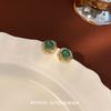 Pendientes vintage sencillos de perlas y flores verdes, diseño nuevo de 2024, exquisitos pendientes de temperamento que combinan con todo.