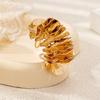Europa y Estados Unidos venta caliente transfronteriza personalidad exagerada hojas flores irregular forma de abanico girasol flor anillo mujeres banquete pastel