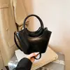 Cesta de vegetais bolsa pequena feminina 2026 novo estilo couro macio brilhante alça redonda bolsa de ombro tote bolsa transversal moda nicho moderna