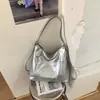 Bolsa de dumplings de gran capacidad para mujer, nuevo diseño de nicho vintage 2026, bolso de hombro cruzado, mochila multifuncional
