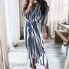 Ropa de mujer transfronteriza europea y americana 2026 nueva colección de verano: vestido elegante y de moda, de botones, plisado, corte ajustado