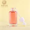 Botella de vidrio de fondo grueso, recta, de hombros redondos, en stock; botella de vidrio transparente con gotero de boca ancha; material de embalaje para botella de aceite esencial de 10-120 ml