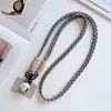 Cordón cruzado para teléfono móvil, cadena para colgar con diseño de dibujos animados tejido a la moda, con clip, funda para teléfono móvil fuerte y duradera, cordón anti-pérdida