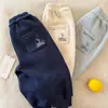 Calças Infantis Transfronteiriças Outono/Inverno 2026 Meninos Desenho Animado Quente Plus Veludo Calças de Moletom Bebê Criança Pequena Casuais Joggers